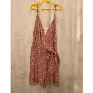 Light pink romper with star pattern